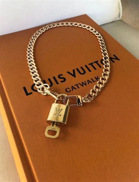 louis vuitton lock necklace real vs fake|best knock off louis vuitton.